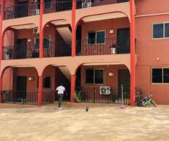 TWO BEDROOMS APARTMENT AT AYIGBE TOWN CLOSE TO WEST HILLS MALL